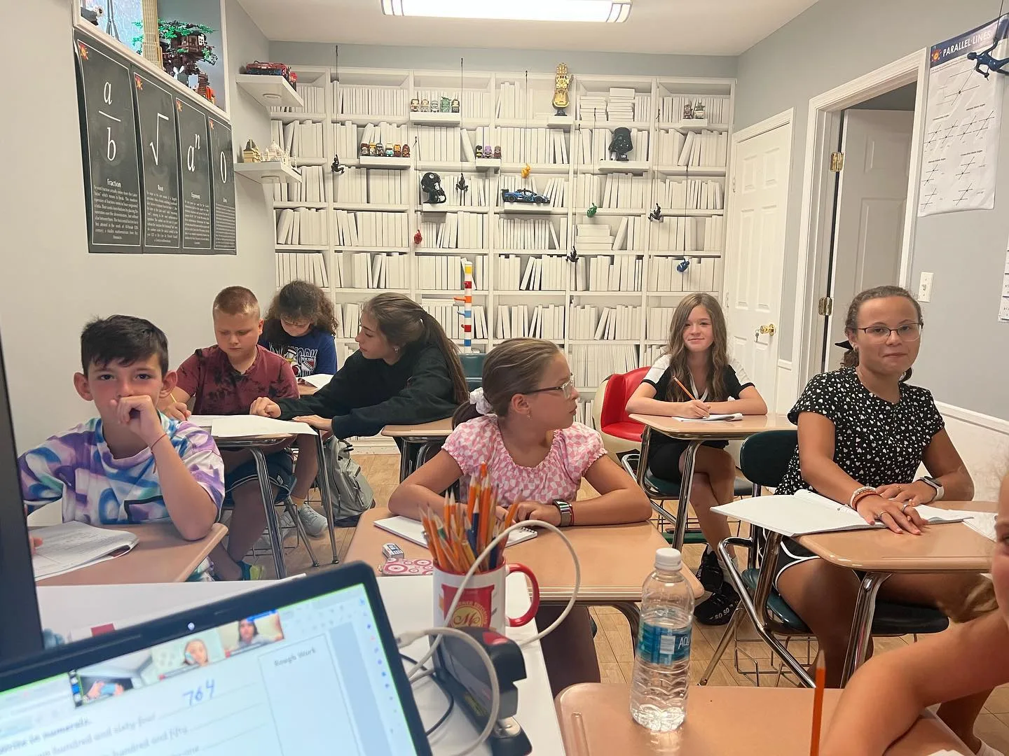 Students working at desks in the Math Corner classroom